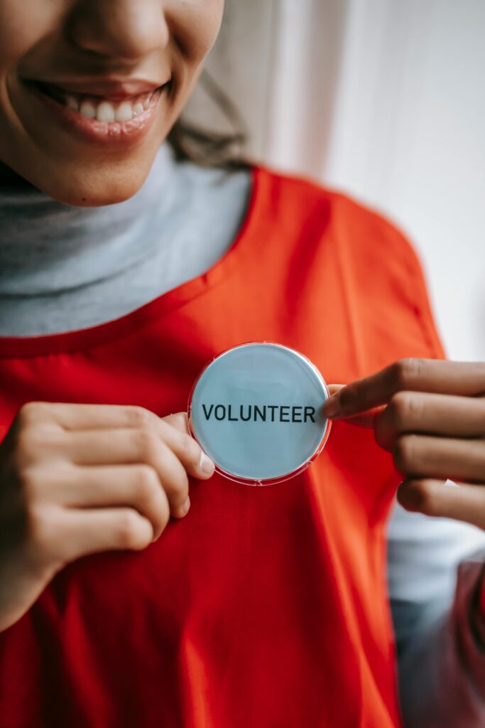 Volunteer with badge